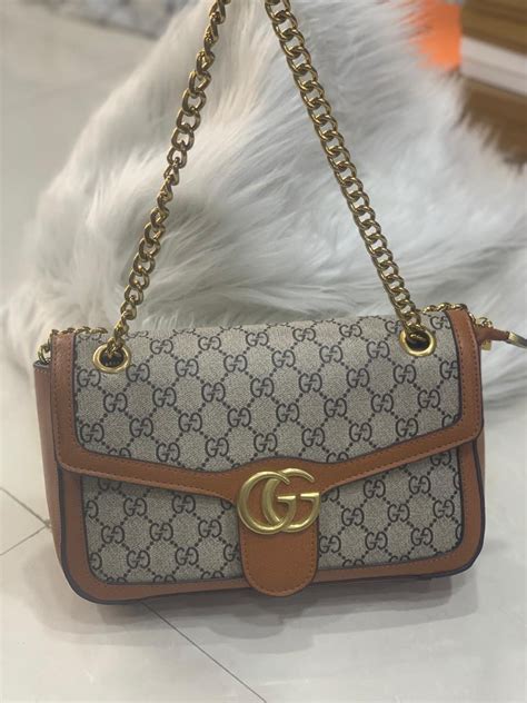 gucci blondie chained shoulder bag.